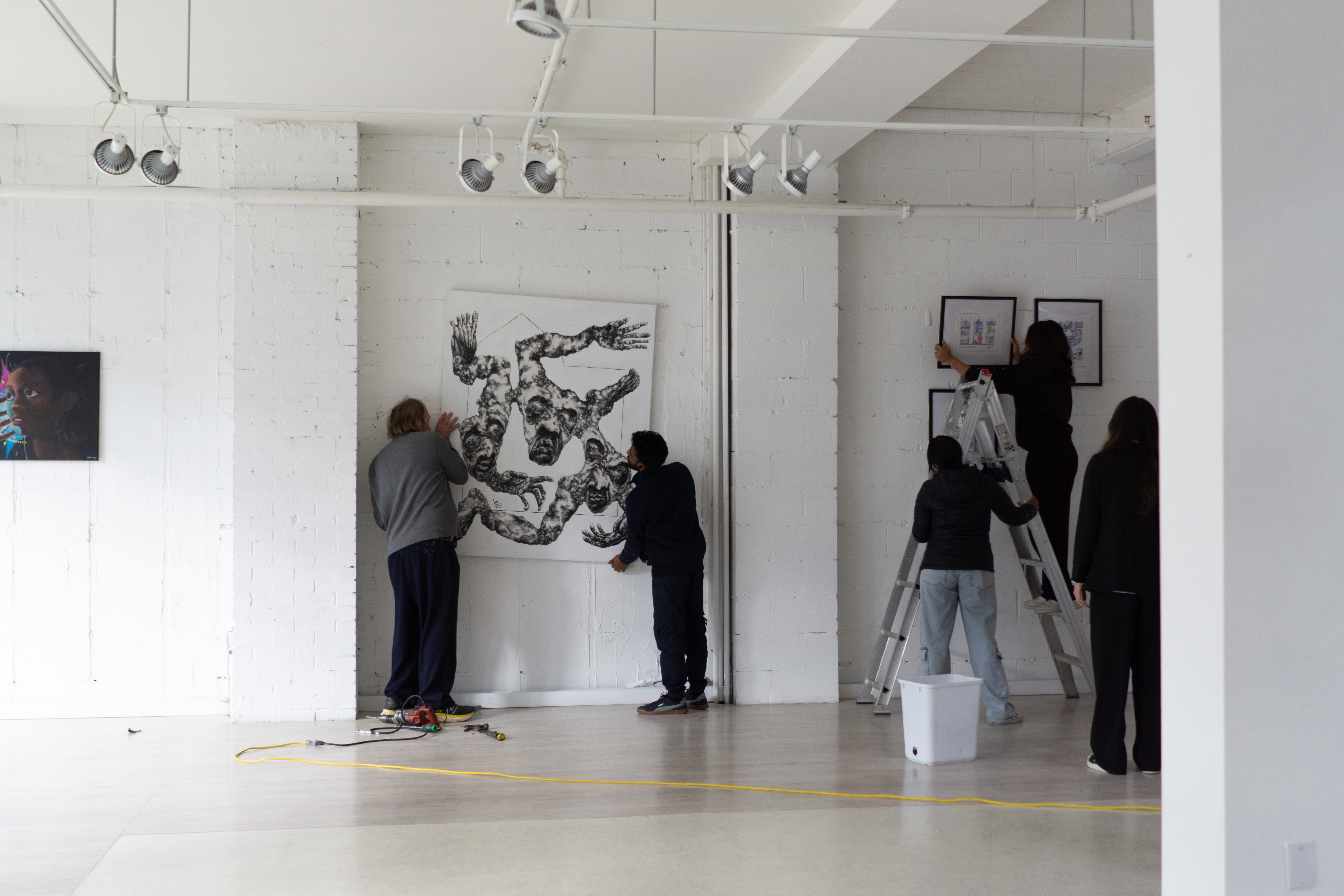 People setting up art installation